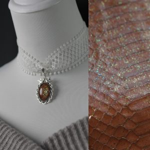 Silver, brown, green, and gold fire